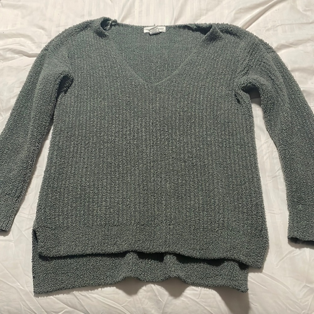 Green V-neck sweater